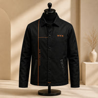 NYK Orange Line - A Study in Black Panel Confidence